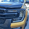 Black and gold ford ranger 2022 with matte black headlight covers featuring bold grille and angular led headlights