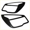 Black plastic headlight trim covers with a sleek glossy finish and angular design for holden colorado 2012 2016 matte black