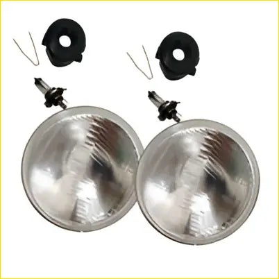 Two chrome round 7 inch headlight assemblies with black plastic mounts and wiring for semi sealed super bright h4 60w kit