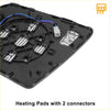 Black plastic heating pad with connectors and fins on back of heated white mirror glass for toyota tundra