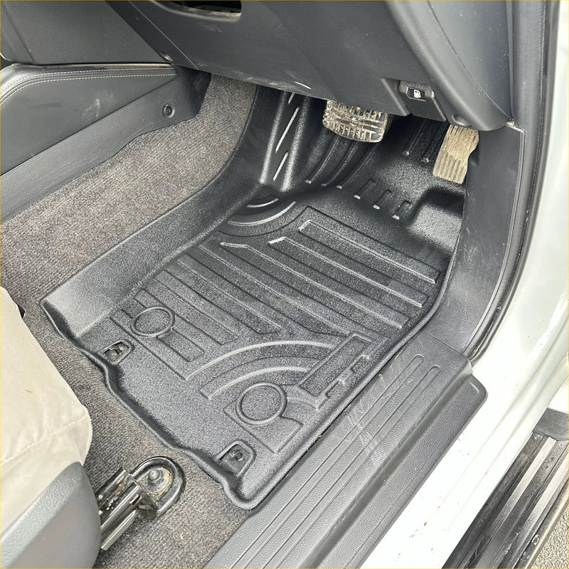 Black rubber heavy duty floor mat with molded ridges for a snug fit on Mitsubishi Triton 2015-2023 models