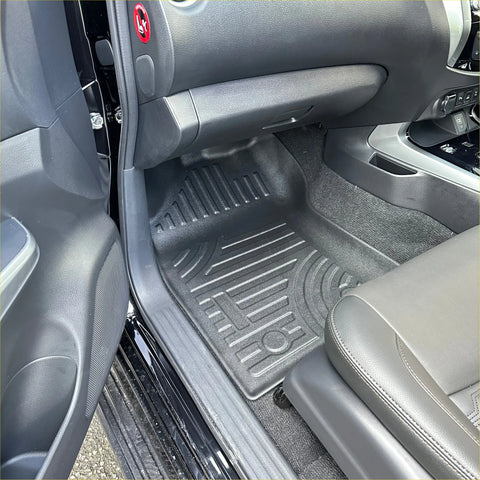 Black rubber heavy duty mat with textured ridges and circular grip patterns for nissan navara 2015-2025