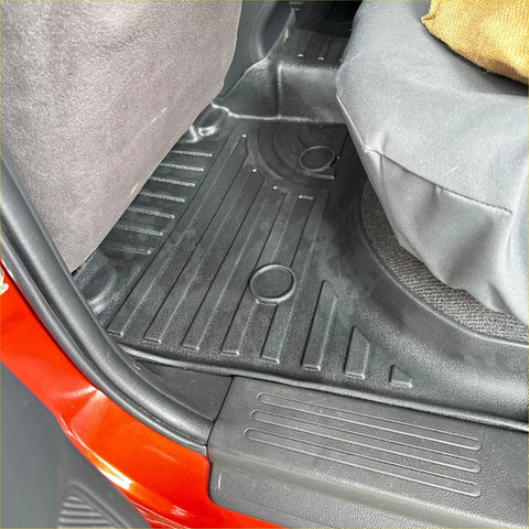 Black rubber heavy duty mat for Toyota Hilux 2015-current with textured ridges and molded contours for grip and protection