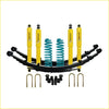 Yellow and black suspension kit with teal coil springs for toyota land cruiser 78 series off-road use