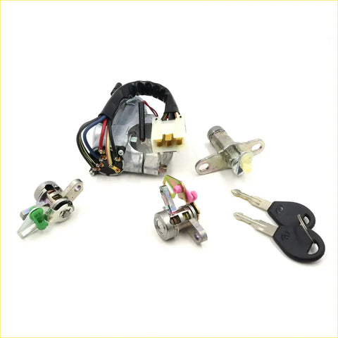 Silver ignition cylinder door bootlock with black wiring and white connector plus keys for nissan cefiro a30 1994-2000