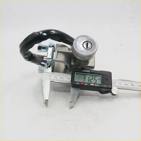Black and silver metal ignition cylinder steering door lock with keyhole for Mazda B-Series B1600 B1800 mounted on bracket