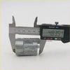 Silver metallic ignition cylinder switch for nissan navara d22 1997-2004 being measured with digital caliper