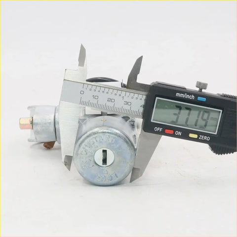Silver metal ignition door bootlid lock with keyhole and engraved markings for nissan maxima a33 qx cefiro 2000-2003 measured at 37.19 mm