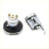 Silver ignition door fuel cap lock cylinder with black base and gold screws for toyota hilux 4th gen back view