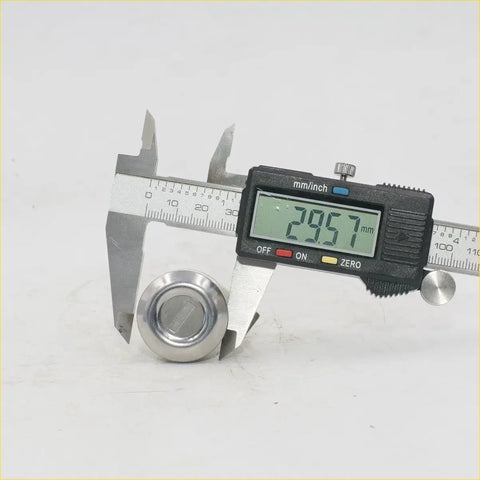Shiny silver metallic ignition door fuel lid lock button for toyota hilux 4x4 sr5 measured at 29.57 mm diameter