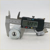 Silver metal ignition steering door fuel lock cylinder for datsun nissan b110 120 140 being measured with caliper