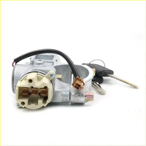 Silver metal ignition switch with beige plastic housing and black wiring plus keys for nissan pulsar n16 steering lock