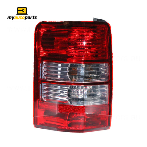 APG All Crash Red/Clear Tail Lamp Passenger Side OEM