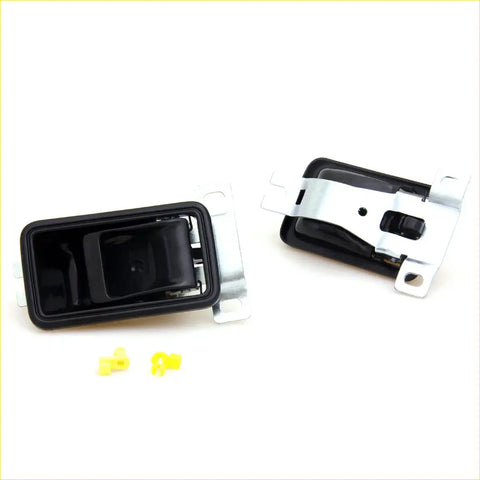 Black plastic inner door handle with metallic bracket for Toyota Hilux RN30 RN36 RN40 LN30 LN40 1978-1983 showing back side