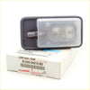 Gray plastic interior dome light for Toyota Hilux 1997-2005 with clear textured lens and on off door switch