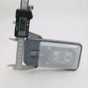 Gray plastic interior dome light for toyota hilux with clear textured lens and integrated switch back view