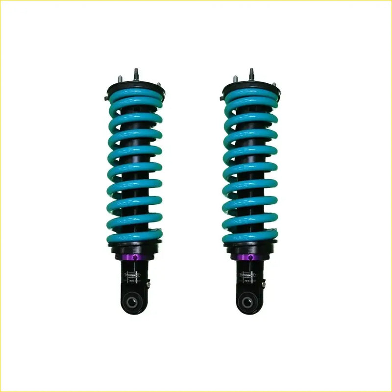 A pair of dobinsons ims monotube front shock absorbers with teal springs and purple accents for isuzu mu-x ucs85