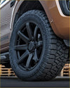 Black matte finished alloy wheel with aggressive tread pattern kumha branding on kendaklever at 285 50 r20 tire sidewall