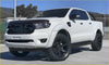 White ford ranger pickup truck with black accents and rugged kenda klever at2 275 55 r20 tires visible from the front