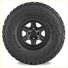 Black kenda klever mt2 285/75 r16 tire mounted on a black alloy wheel showing rugged off-road tread design