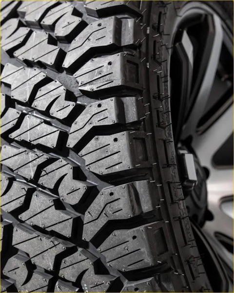 Black rubber off-road kenada klever rt tire with aggressive tread pattern and deep grooves size 265 50 r20