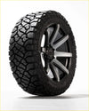 Kenda klever rt black all-terrain tire mounted on a two-tone black and silver alloy wheel for rugged use