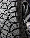 Black rubber kenda klever rt 275/55 r20 off-road tire with aggressive tread pattern and deep grooves