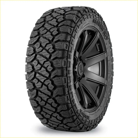 Black rubber kenda klever rt off-road tire with aggressive tread mounted on black alloy wheel 35x12.5 r20