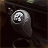 Black leather gear knob kit with stitched detailing and white labeled gear pattern for smooth shifting control