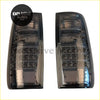 Back side of black smoked led taillights for Toyota Land Cruiser with sleek modern design and multiple circular lights