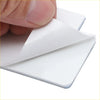 A finger peeling a white adhesive-backed square sticker from its backing for led interior light set toyota hiace