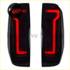Black led tail lamp lights for nissan navara d40 frontier with sleek modern design and vibrant red illuminated strips