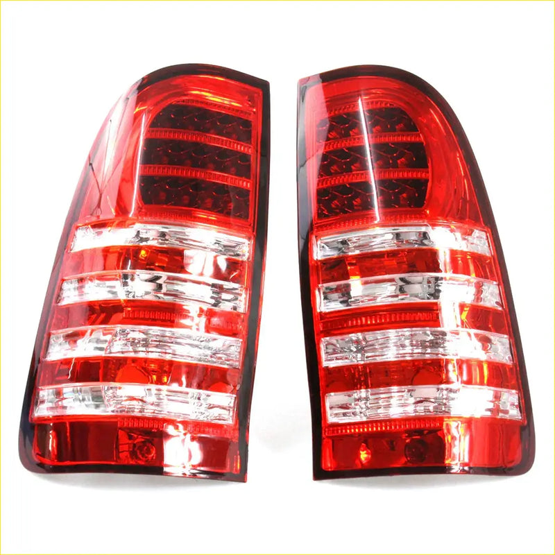 Red led tail light x2 for toyota hilux sr5 2004-2016 with clear lens sections and sleek modern design back side view