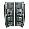 Black plastic led tail lights pair showing back side with internal wiring and mounting hardware for easy installation