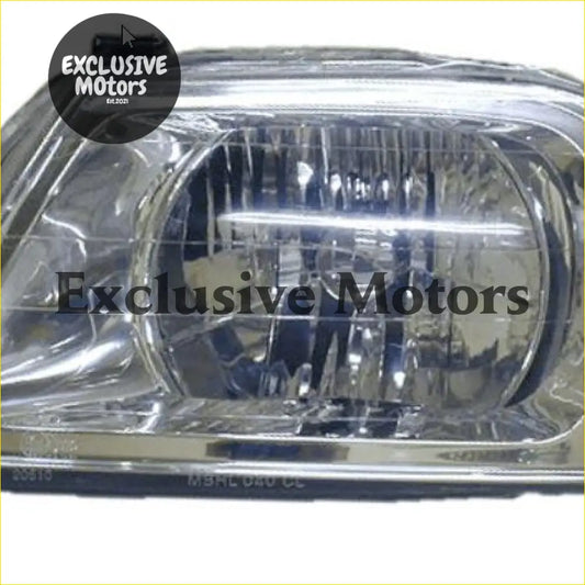 Left-hand headlight for mitsubishi triton 1996-2005 with clear plastic lens and reflective interior showing components