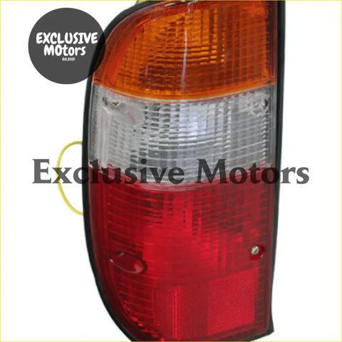 Left-hand tail light for ford courier 1999-2002 with red and amber plastic lens and clear section