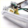 Gray plastic lh headlight door for toyota hilux 2wd 1979-1982 with textured lens and wiring connector shown from the back