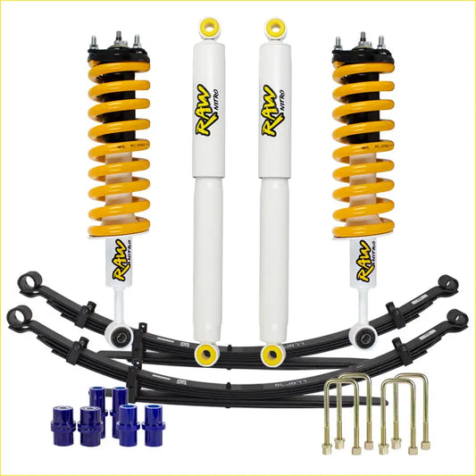 Set of four yellow and white raw nitro coilover shocks with black leaf springs and gold u-bolts for toyota lift kit