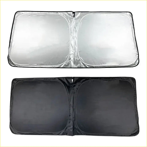 Silver reflective magnetic windscreen sun shade with black fabric backing and reinforced edges for 78 series 1999+