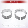 Two silver metallic split engine bearing journals with engraved markings from main bearing kit for toyota land cruiser