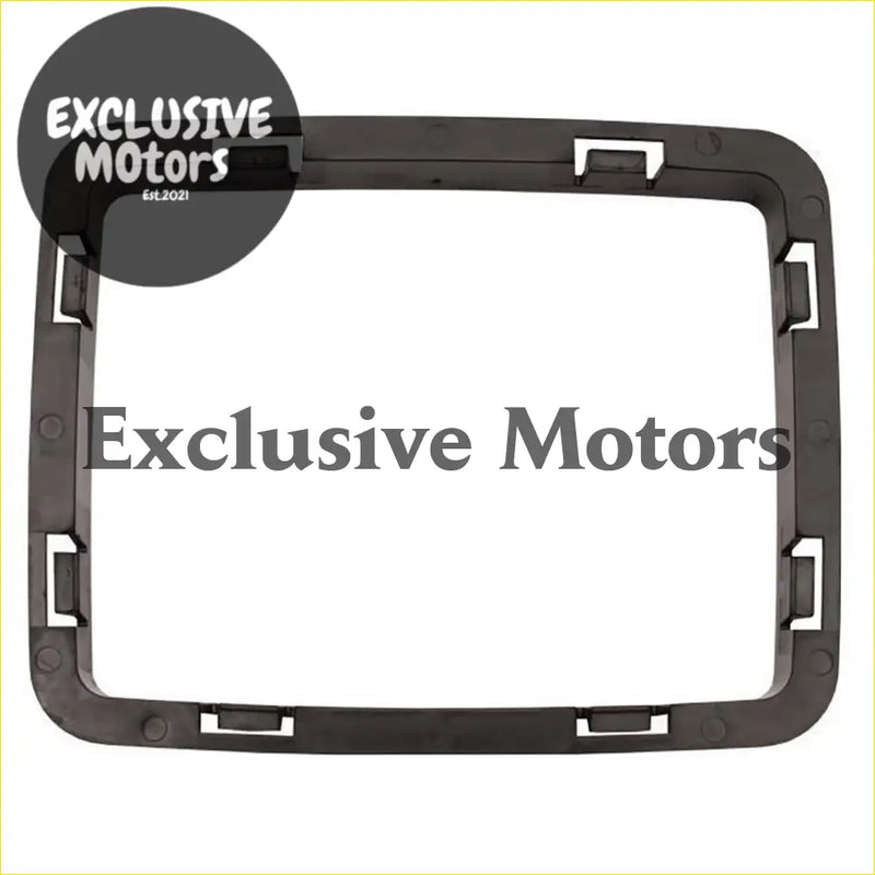 Black plastic dashboard frame with integrated mounting clips shown from back for manual console boot retainer trim Holden Commodore VL