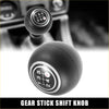 Black rubber manual gear stick shift knob with white and silver labeled 5 speed pattern for toyota land cruiser