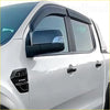 Black plastic matte door visors installed on side windows of white ford ranger pickup truck 2012-2021