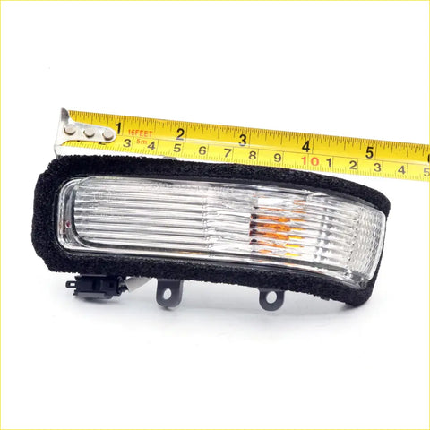 Black-framed mirror cover turn signal light for toyota hilux 2015-2018 with clear ribbed lens and amber indicator
