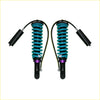 A pair of teal-coiled Dobinsons monotube suspension shocks with black and purple accents for Mitsubishi Triton ML MN