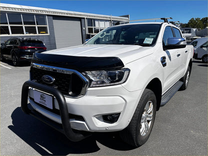 White ford ranger pickup with black monsoon and bonnet guard aftermarket style px2 px3 and chrome accents