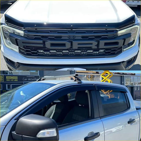 Black matte finish ford ranger grille with integrated led lights and matching black window visors on silver pickup