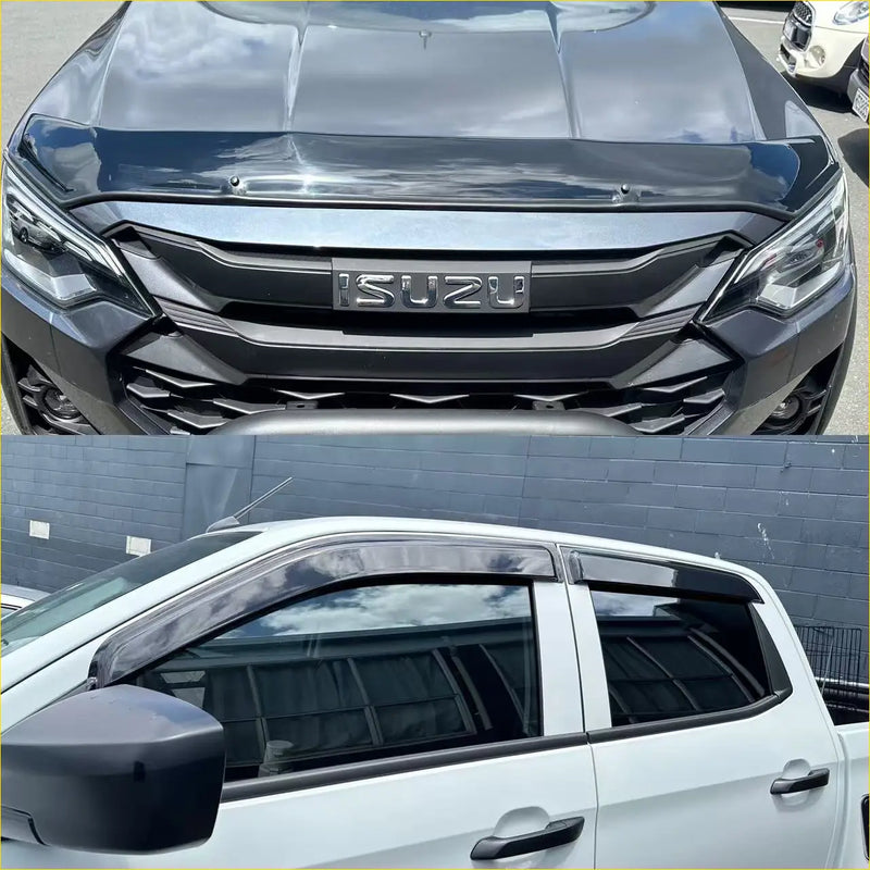Black matte finish isuzu d-max 2024 pickup truck with sleek angular front grille and black side window visors monsoon bonnet guard