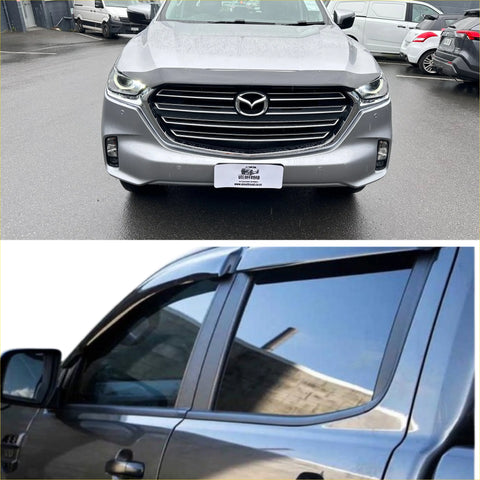Silver mazda bt-50 suv with sleek modern grille sharp led headlights featuring monsoon and bonnet guard 2021+