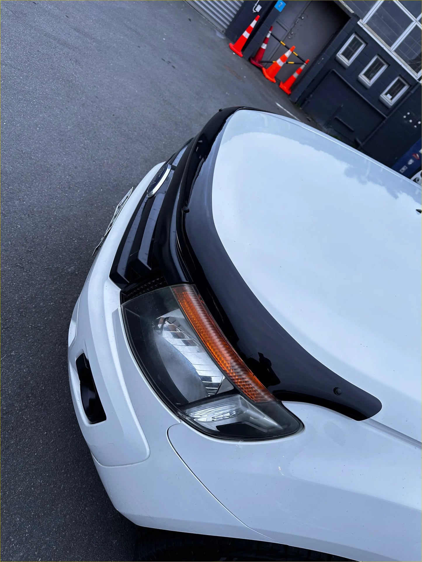 White ford ranger px1 2012-2015 with a glossy black monsoon bonnet guard oem style front bumper cover